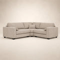 Luxury beige corner sofa with plush cushions and dark legs, ideal for modern living rooms