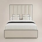 Luxury cream upholstered bed with black piping, white quilted bedding, and matching pillows for modern bedrooms