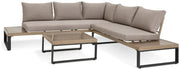 Modern outdoor sectional sofa with beige cushions and matching coffee tables, perfect for luxury patio furniture.